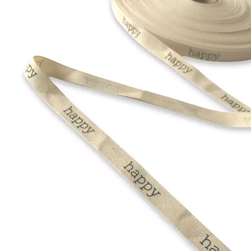 Baumwollband mit Schriftzug "happy"