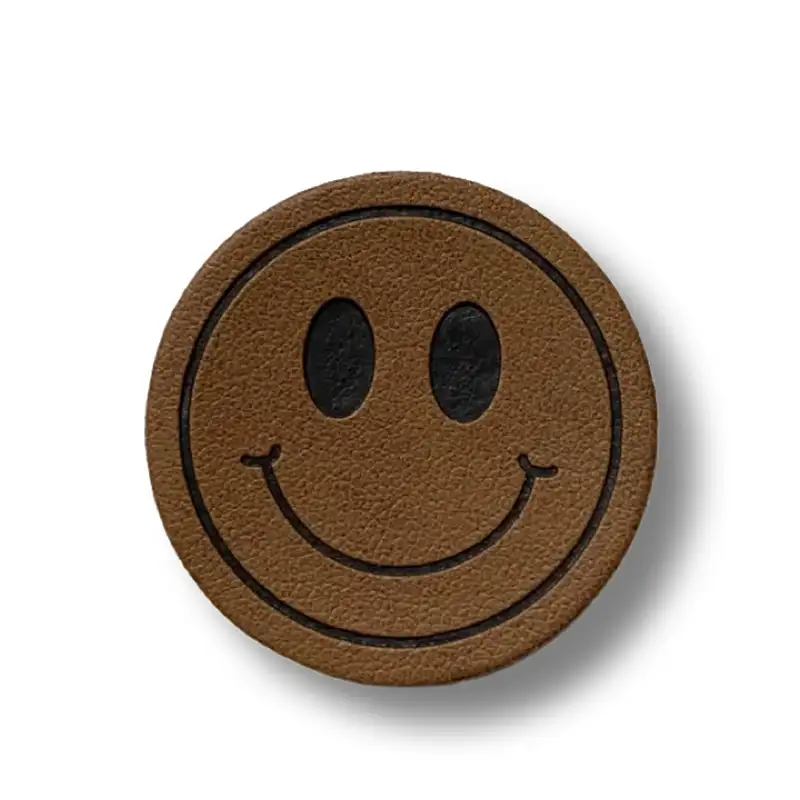 Kunstleder Etikett in Form eines Smileys