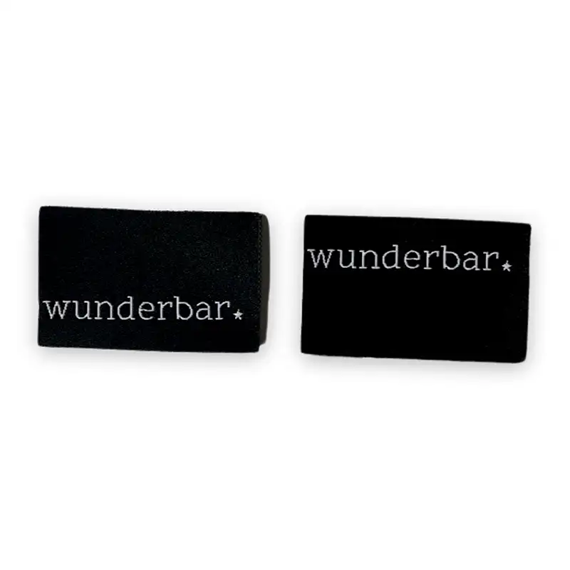 Weblabels in schwarz mit weißer Aufschrift "wunderbar"
