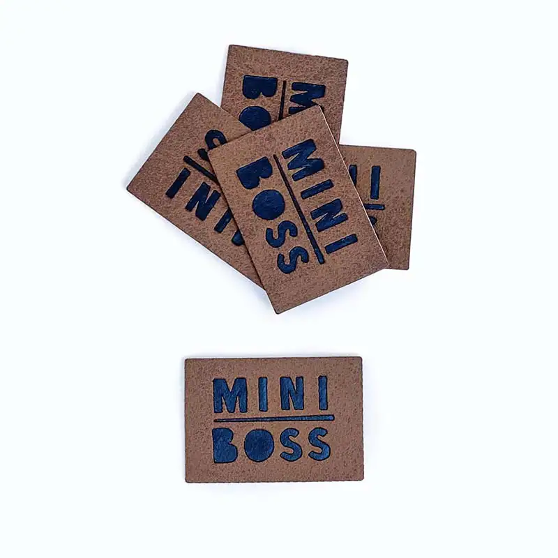 Lederlabel braun mit schwarzer Aufschrift Mini Boss