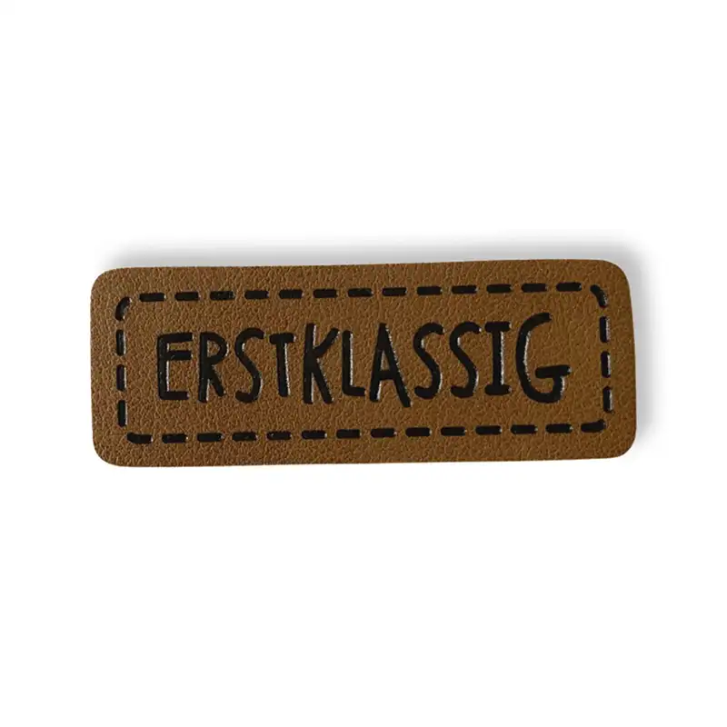 Lederlabel mit Aufdruck erstklassig