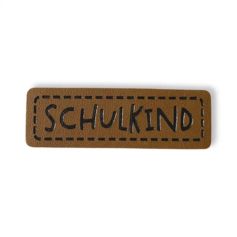 Lederlabel mit Aufschrift Schulkind