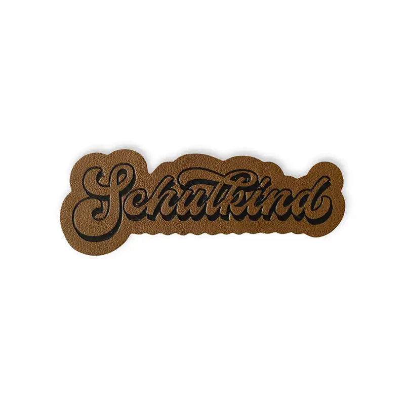 Lederlabel im Retrostyle und dem Schriftzug Schulkind